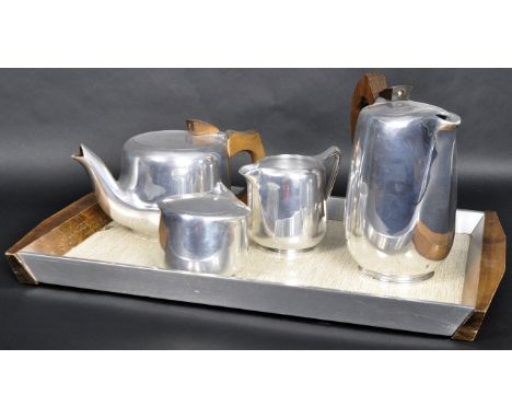 A vintage retro mid 20th Century Picquot Ware coffee/ tea service made from stainless steel and beech wood including a teapot
