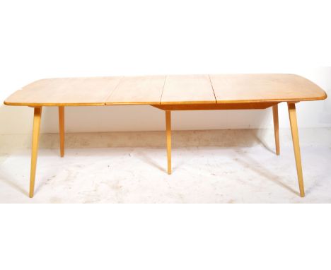 Lucian Ercolani - Ercol - Grand Plank - A large retro vintage mid 20th Century beech and elm extending dining table having an