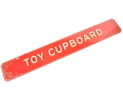Hamleys - A large vintage 20th Century hand painted toy shop sign for Hamleys having a rich red ground colour with gilt borde