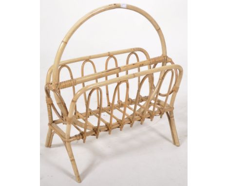 A retro vintage 1960's Italian bamboo cane / wicker magazine rack in the manner of Franco Albini. The magazine rack having a 