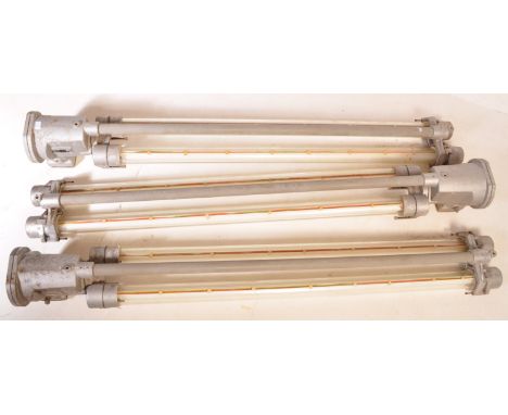 A selection of three large 20th Century retro vintage Industrial explosion proof suspension tube strip lights by Thorn. All h