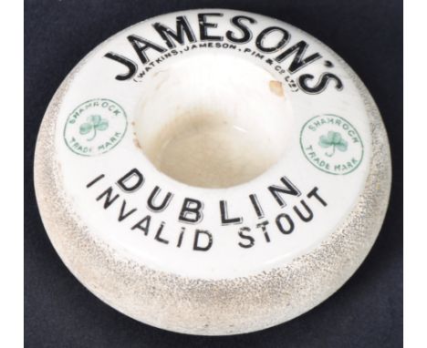 Jameson's Dublin - An early 20th Century Irish advertising point of sale ceramic match holder and striker of squat globular&n