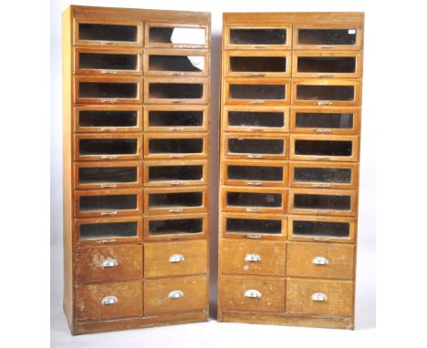 A matching pair of large retro vintage 20th Century Art Deco upright shop display haberdashery cabinets with each comprising 