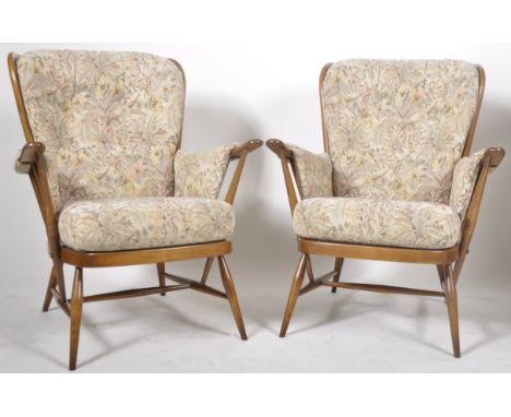 Lucian Ercolani - Ercol -&nbsp; Jubilee Range - A matching pair of 20th Century retro vintage wingback armchairs / easy loung