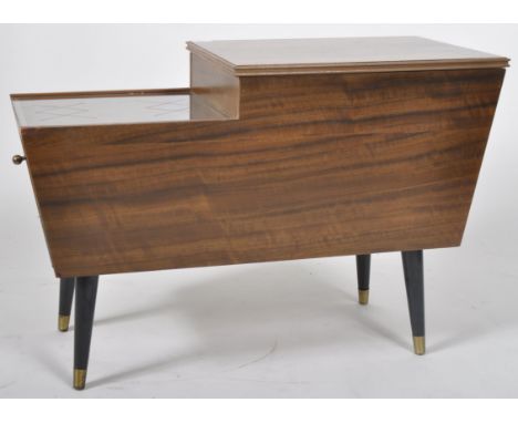 A retro vintage mid 20th Century 1950's walnut cocktail drinks cabinet having a sliding etched glass top section with open in