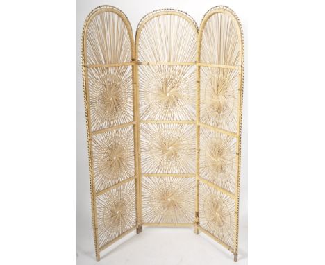 A retro vintage 20th Century sunburst wicker and rattan three fold room / partition screen. Each panel being hinged with thre