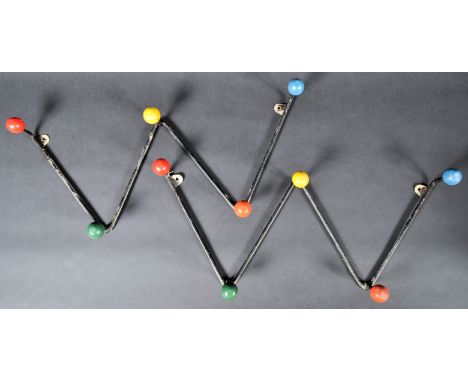 A matching pair of retro vintage mid 20th Century sputnik atomic coat hooks of 'W' shape with each having wooden painted mult