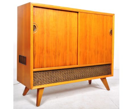 Grundig - A retro vintage mid 20th Century walnut veneered radiogram / music system having 3D Sound and a Garrard record deck