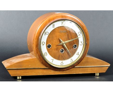Benting - A retro vintage 20th Century Art Deco walnut barrel cased mantel clock having a circular brass dial with white fini