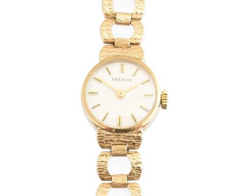 A 1970s 9ct gold Tissot watch, the signed circular dial with baton hour markers, 17 jewel movement within a 9ct gold case, to