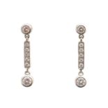 A pair of 18ct gold diamond earrings,