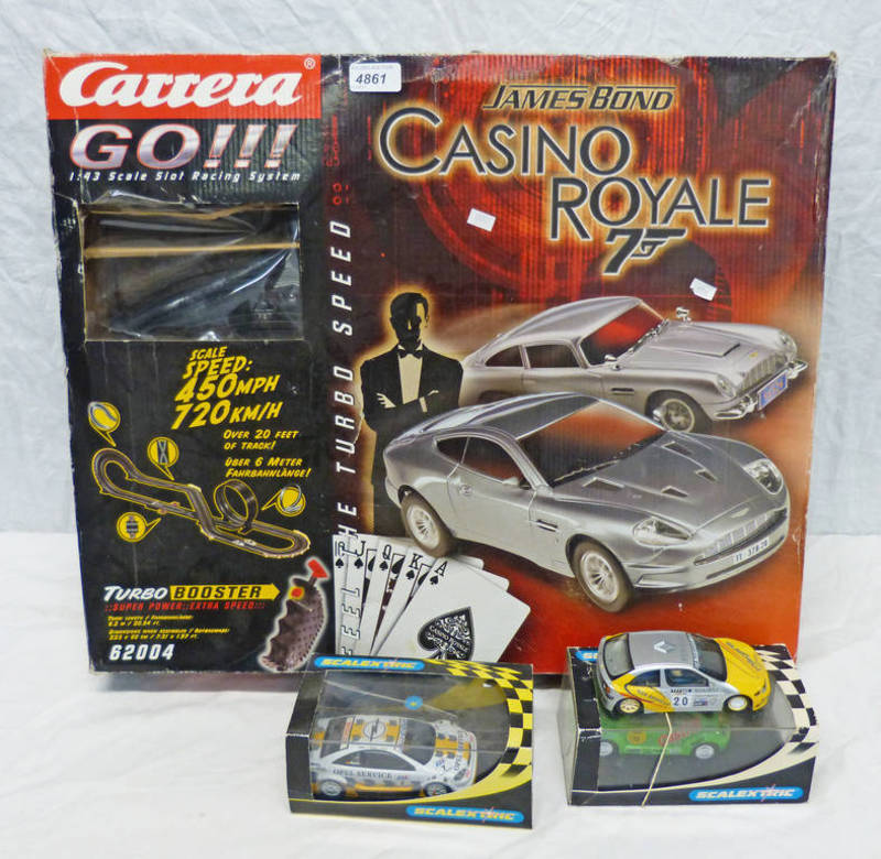JAMES BOND 007 CASINO ROYALE ELECTRIC CAR RACING SET TOGETHER WITH TWO SCALEXTRIC CARS INCLUDIN