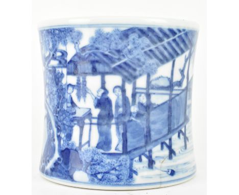A Qing dynasty blue and white ceramic "Bitong" brush pot. The blue and white brush pot, of cylindrical form, decorated with&n