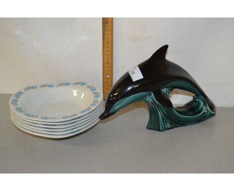 A Poole Pottery dolphin together with a quantity of Barretts heart shaped dishes