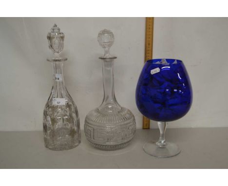 Victorian clear and cut glass decanter decorated with vines and grapes together with a further decanter and a mid Century ove