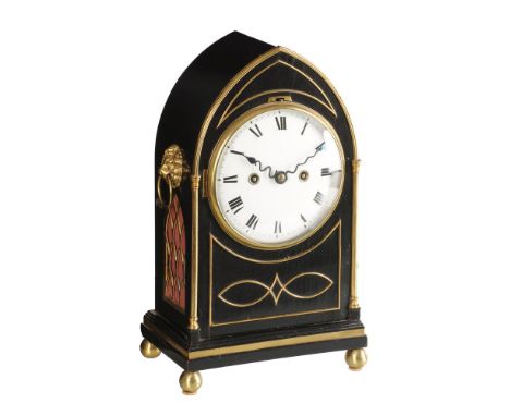 A Regency brass mounted ebonised small lancet bracket clock with trip hour repeat   Unsigned, early 19th century   The four p