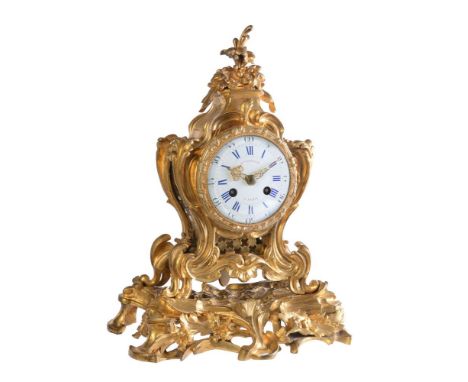 A French Louis XV style ormolu mantel clock   Etienne, Lenoir, Paris, early 19th century   The circular two train outside cou