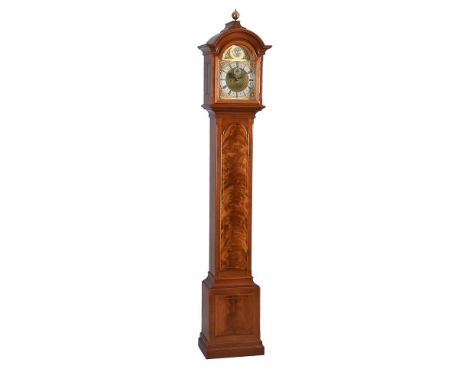 A figured mahogany small eight-day longcase clock Geoffrey Bell, Arlesford, dated 1974 The four knopped pillar rack and bell 