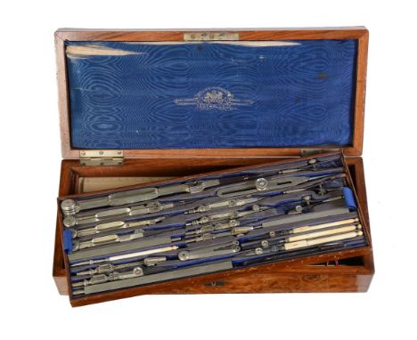 ϒA late Victorian walnut magazine of draughtsman’s drawing instruments W.F. Stanley, London, circa 1890 The interior with blu