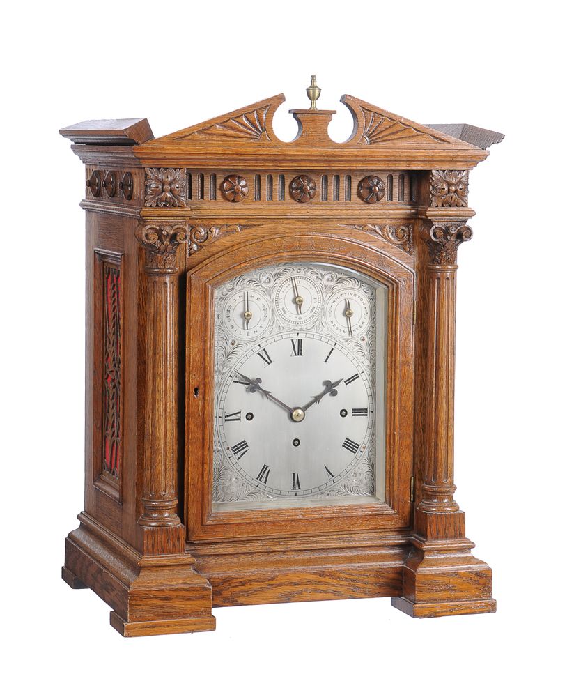 A Victorian carved oak quarter chiming bracket clock Unsigned, late