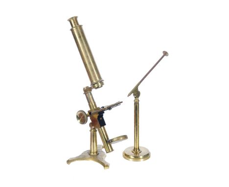 A lacquered brass compound microscope Cary, London, circa 1840 The tube screw-fitting at the objective end into a threaded co