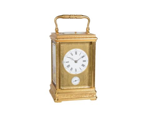 A fine French engraved gilt brass and porcelain panel inset carriage clock with Le-Roy and Fils patent keyless winding, push-