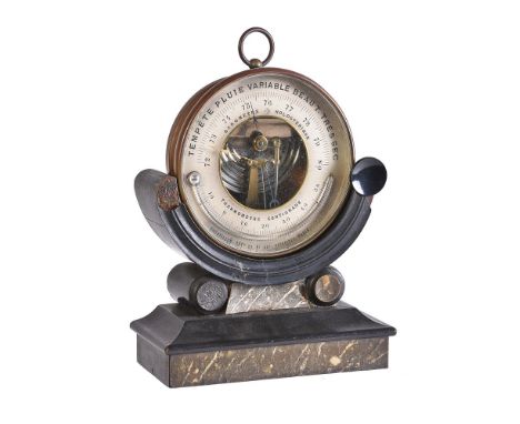 A French aneroid ‘Holosteric’ barometer with thermometer   Retailed by Ducatillon, Paris, circa 1860   The 4.75 inch circular