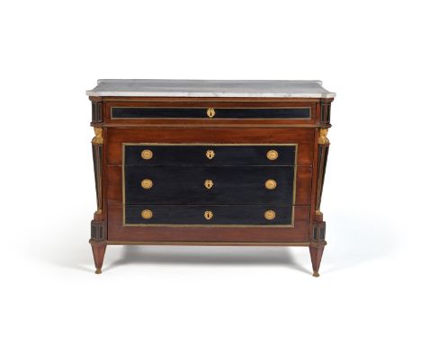 A giltmetal-mounted mahogany and ebony commode, possibly Baltic or Russian, circa 1800, the shaped white marble top above fou