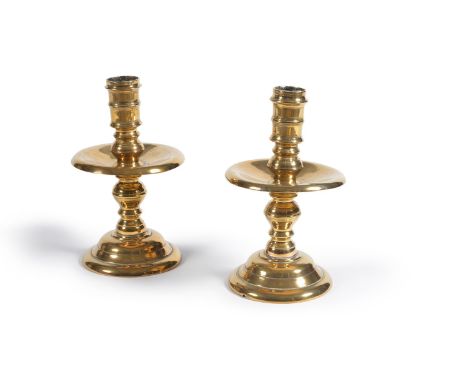 A pair of substantial Dutch cast and turned brass ‘Heemskerk’ type candlesticks, the multi knopped and ring turned stems with