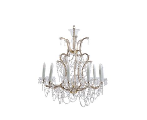 A pair of Continental gilt metal and moulded glass ten light chandeliers, 20th century, the electrical fitments on outscrolle