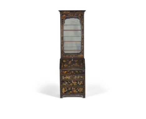 A Chinese Export black lacquer black lacquered bureau bookcase, early 18th century, of narrow proportion, with cavetto cornic