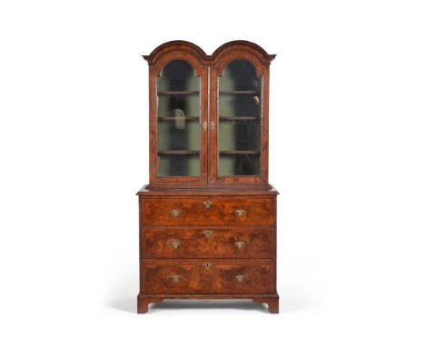 A walnut and burr walnut secretaire cabinet, 18th century, the associated upper section with a double dome cornice above a pa