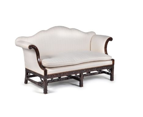 A mahogany and upholstered sofa in George III style, first half 20th century, after the manner of Thomas Chippendale, 100cm h
