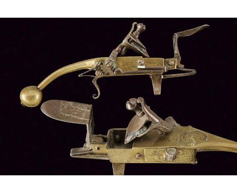 dating: 18th Century provenance: Europe, Brass body, elongated towards the back. The back engraved with floral motifs. Pan at