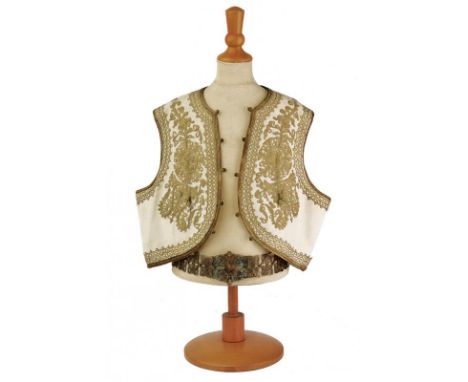 dating: circa 1900 provenance: Balkans, Made of white cloth, richly embroidered with gilded thread floral motifs and geometri