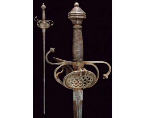 dating: 17th Century provenance: Germany, Double-edged blade of lenticular section, grooved and with remains of inscriptions 