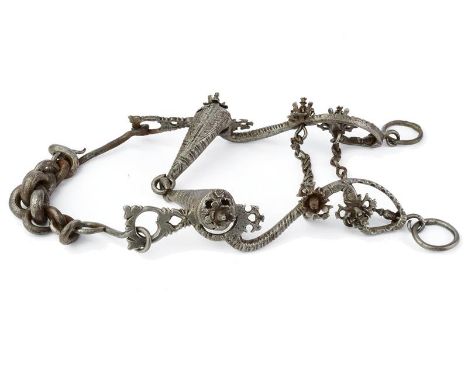 dating: circa 1600 provenance: Italy, Made of iron, guards worked with oblique grooves and fine in-the-round carvings, mouthp