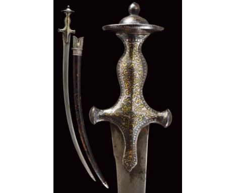 dating: Early 19th Century provenance: India, Curved, single-edged blade with slightly convex sides, in fine damask, the base