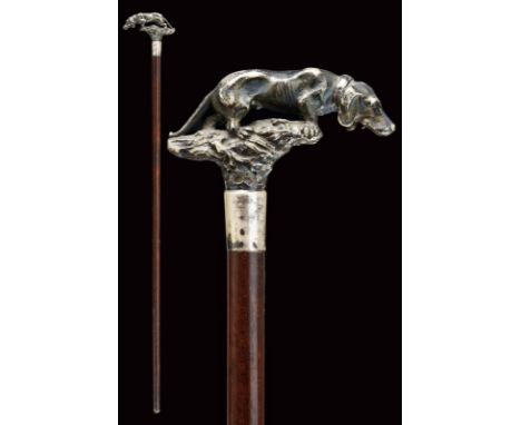 dating: circa 1900 provenance: Europe, Heavy silver grip representing a bloodhound with collar on a trunk, smooth ring nut an