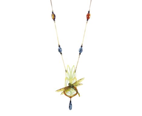 Elizabeth Bonté early 20th century carved horn dragonfly necklace, suspending a glass bead, on silk chord with glass and  res