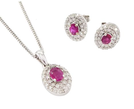Pair of 9ct white gold oval cut ruby and round brilliant cut diamond cluster stud earrings and a matching 9ct white gold pend