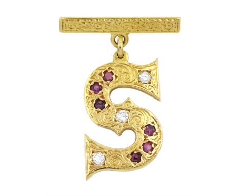 18ct gold round brilliant cut diamond and ruby 'S' pendant brooch, with engraved foliate decoration, stampedCondition Report: