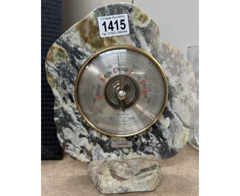 A Granite framed barometer.