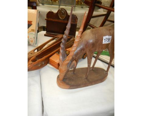 A quantity of wooden items including pipe rack etc.