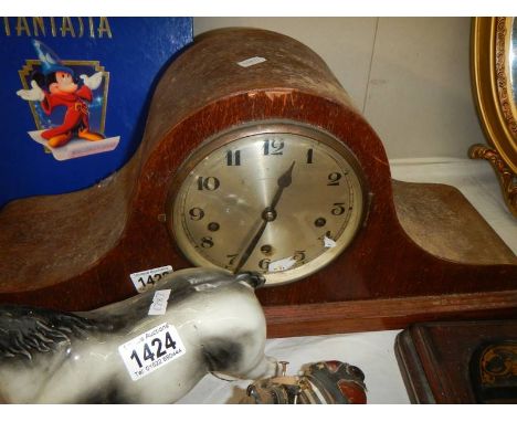 An old Napoleon hat mantel clock.