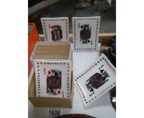 A set of four 'Whist' playing card pin dishes.