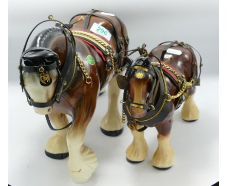 Two Large Ceramic Shire Horses: in working harnesses height of largest 26cm (2) 