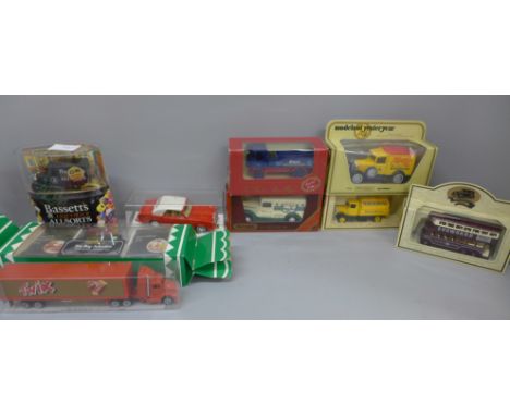 Nine die-cast model vehicles, boxed 
