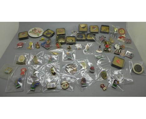 A collection of enamel and other badges 