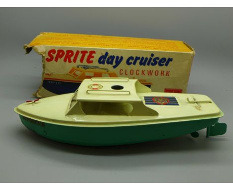 A Sutcliffe model tin-plate Sprite Day Cruiser with key, boxed 
